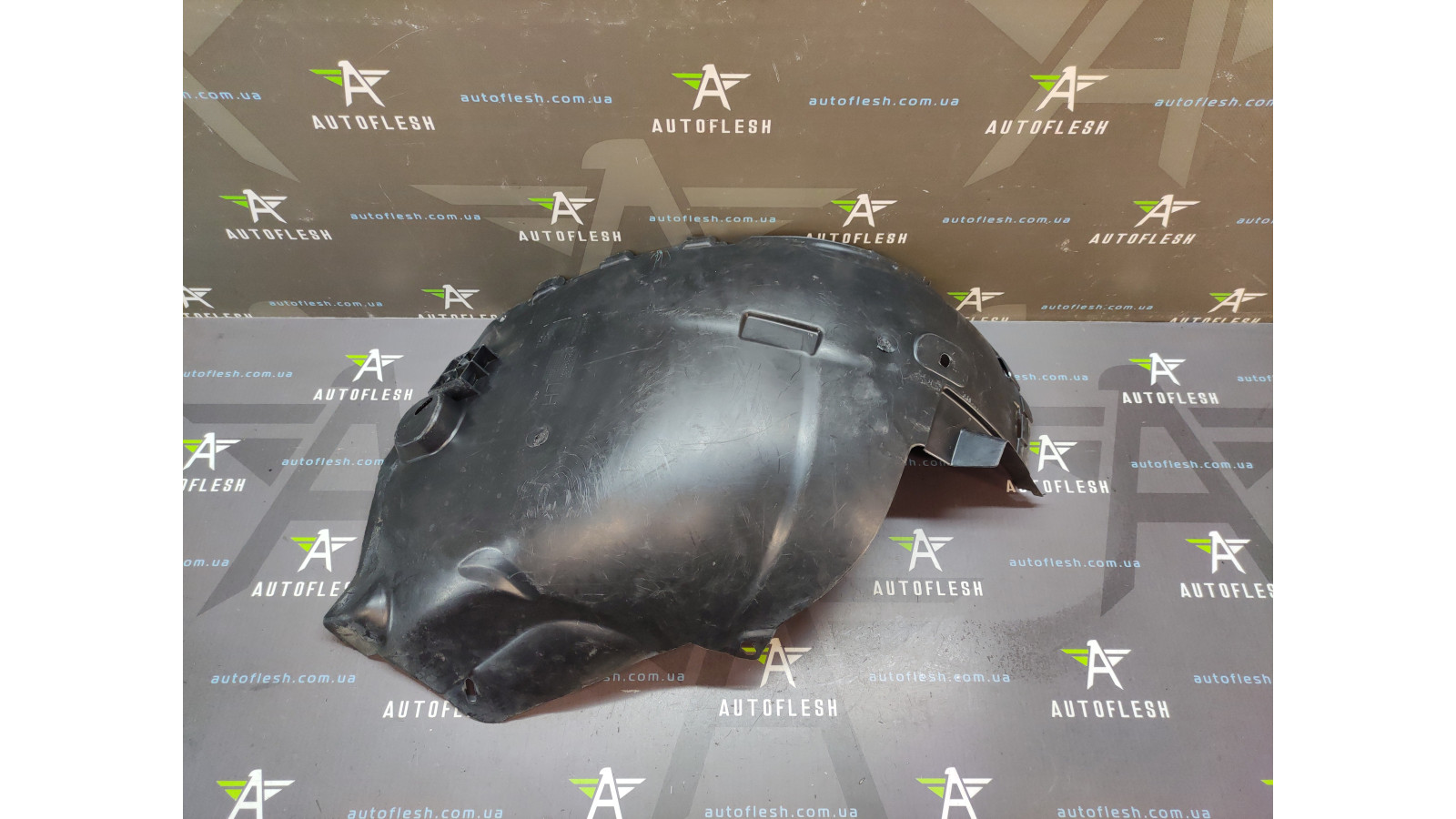Б/в підкрилок передній лівий 13110379 для Opel Astra H