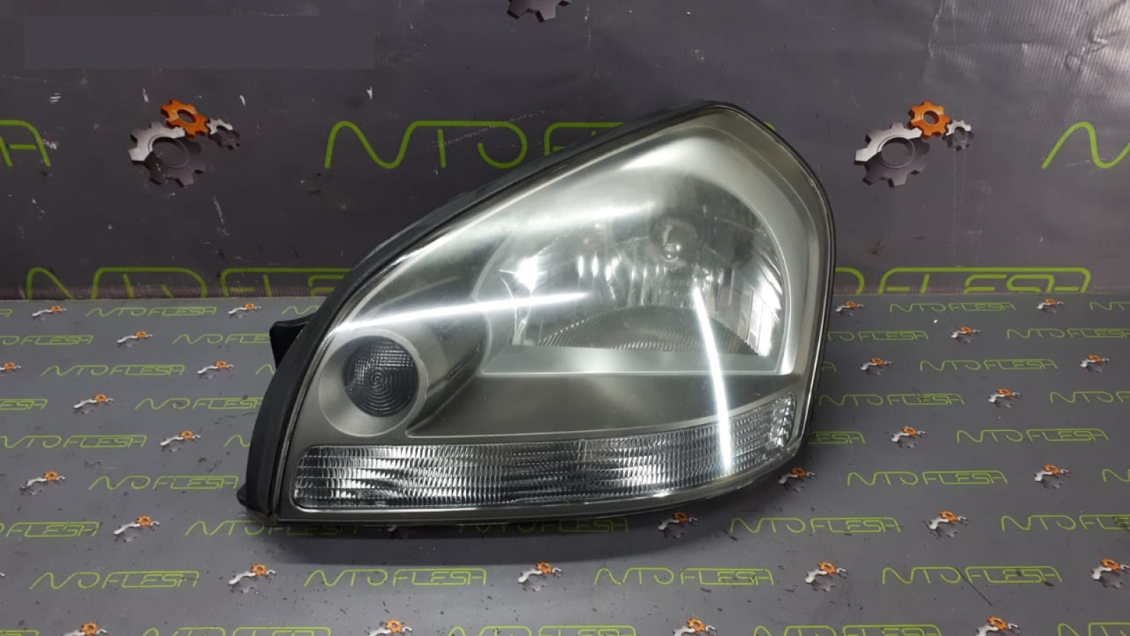 Б/у фара левая 921012E010 для Hyundai Tucson (2004-2010)