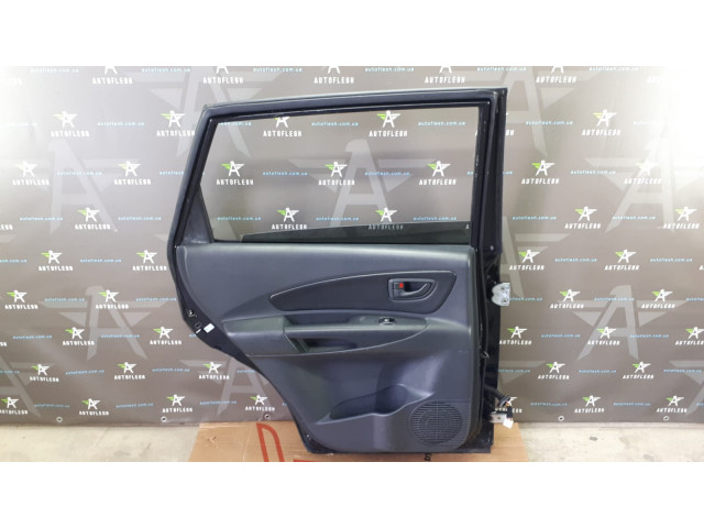 Б/у дверь задняя левая 770032E020 для Hyundai Tucson Б/у дверь задняя левая 770032E020 для Hyundai Tucson
