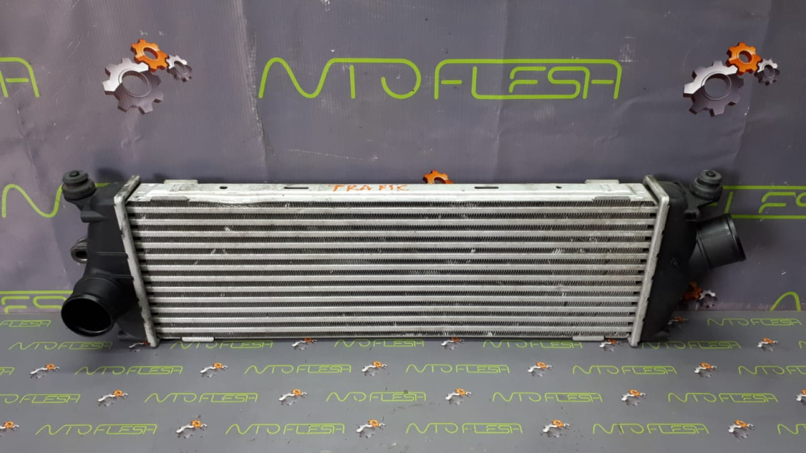 Б/у радиатор интеркуллера 8200411160, Valeo для Nissan Primastar/ Opel Vivaro/ Renault Trafic II Б/у радиатор интеркуллера 8200411160, Valeo для Nissan Primastar/ Opel Vivaro/ Renault Trafic II