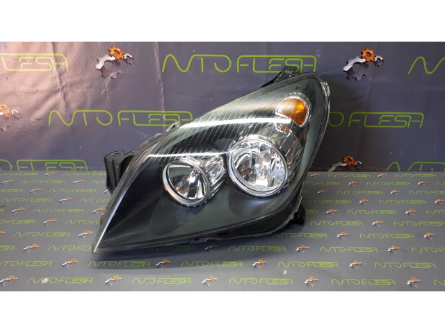 Б/у фара передняя левая 1EG27037001 для Opel Astra H