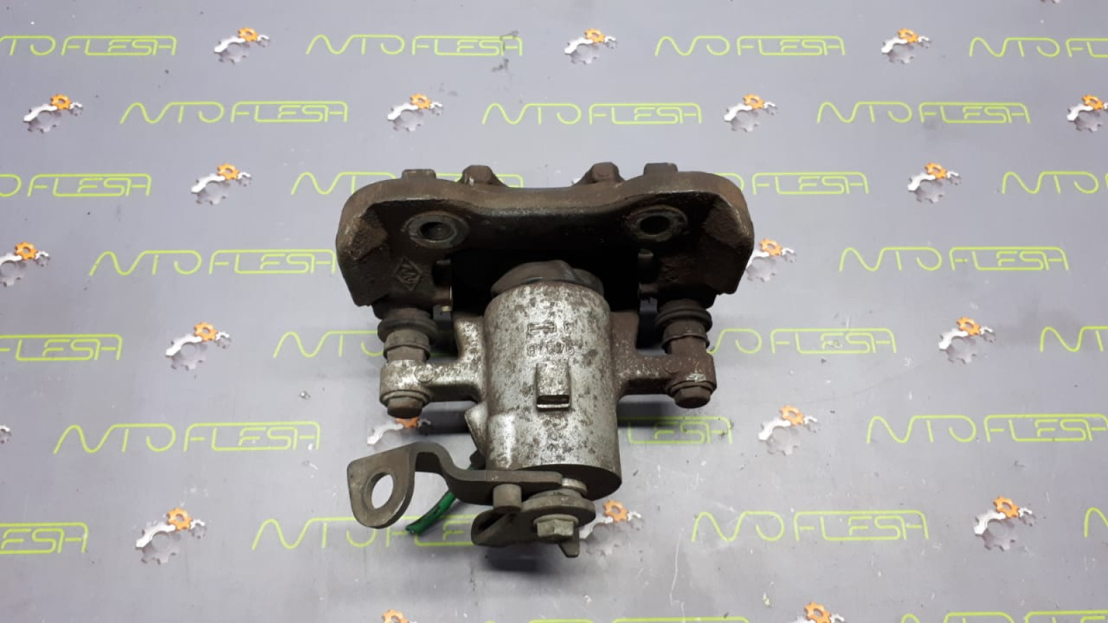 Б/у суппорт тормозной задний 7701207693 для Renault