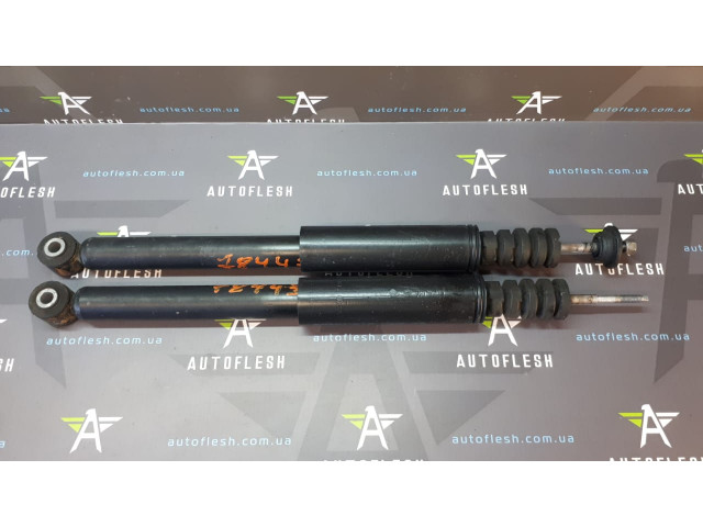 Б/в амортизатор задній 562108573R для Renault Clio III