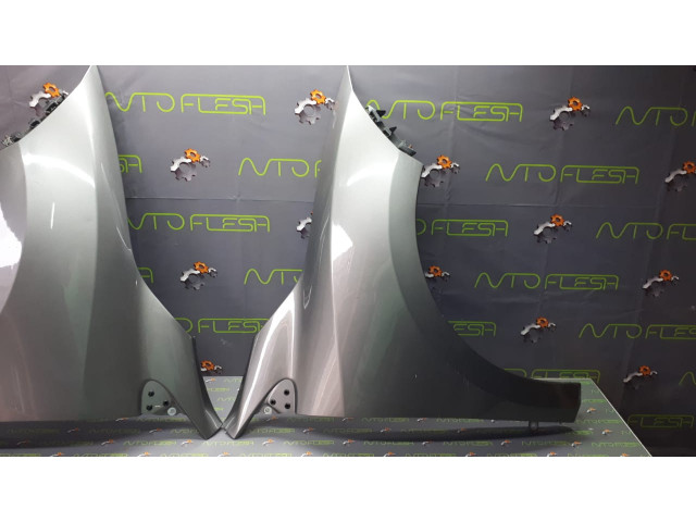 Б/у крыло переднее 631000009R, 8200993338, OV369 для Renault Megane III Б/у крыло переднее 631000009R, 8200993338, OV369 для Renault Megane III